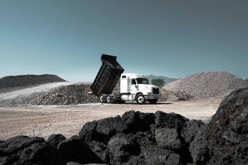 Haul truck at a stockpile